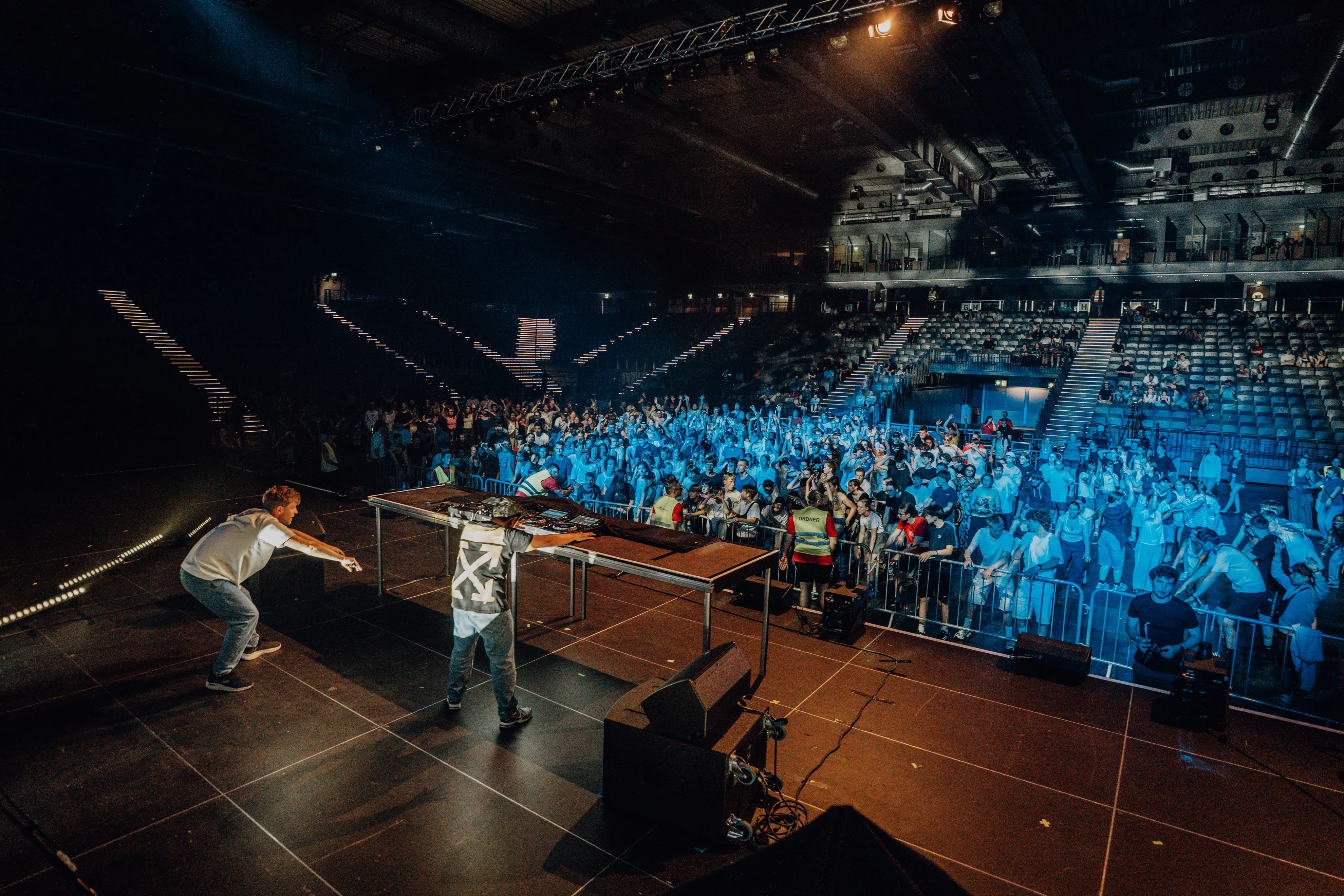 Lukas Goss and DJ Jesus Loves Electro reaching out to the crowd at BUJU 2026 in the Messehalle Erfurt